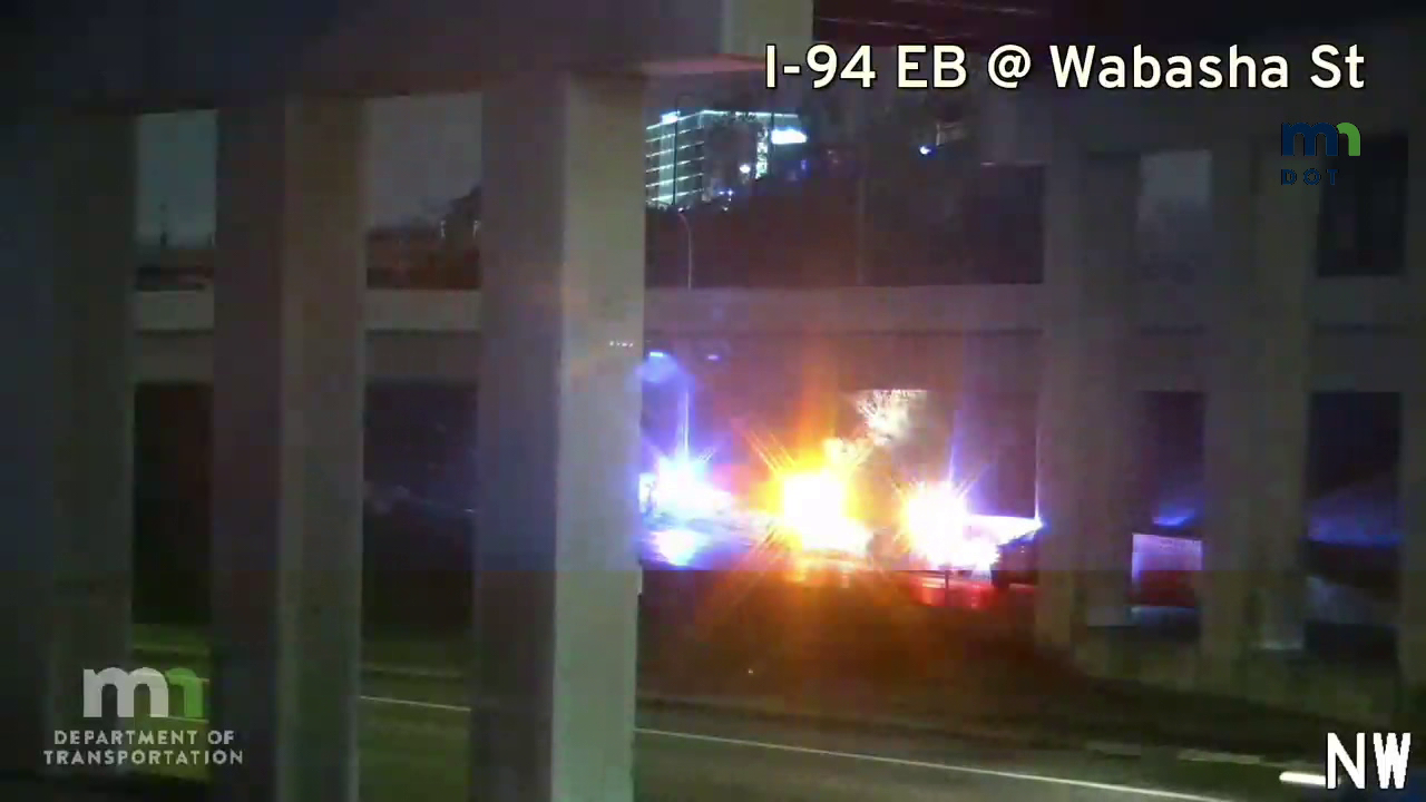 Emergency lights flash at night on I-94 after a vehicle crash involving teenagers.